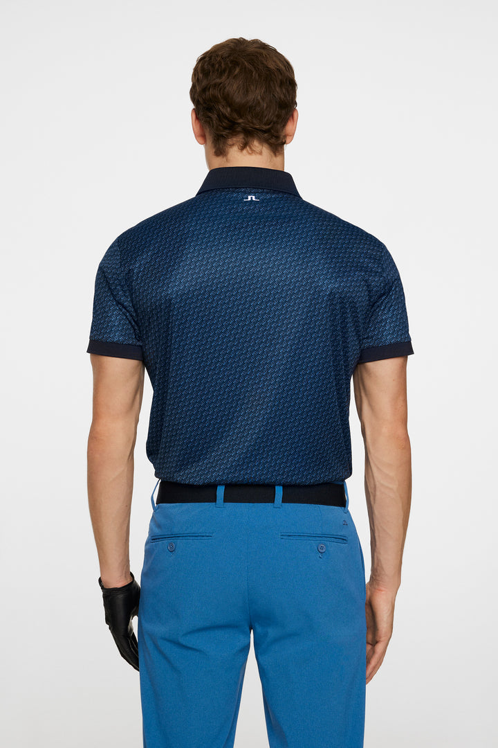 J.LINDEBRG TOUR TECH PRINT POLO SHADOW BRIDGE NAVY
